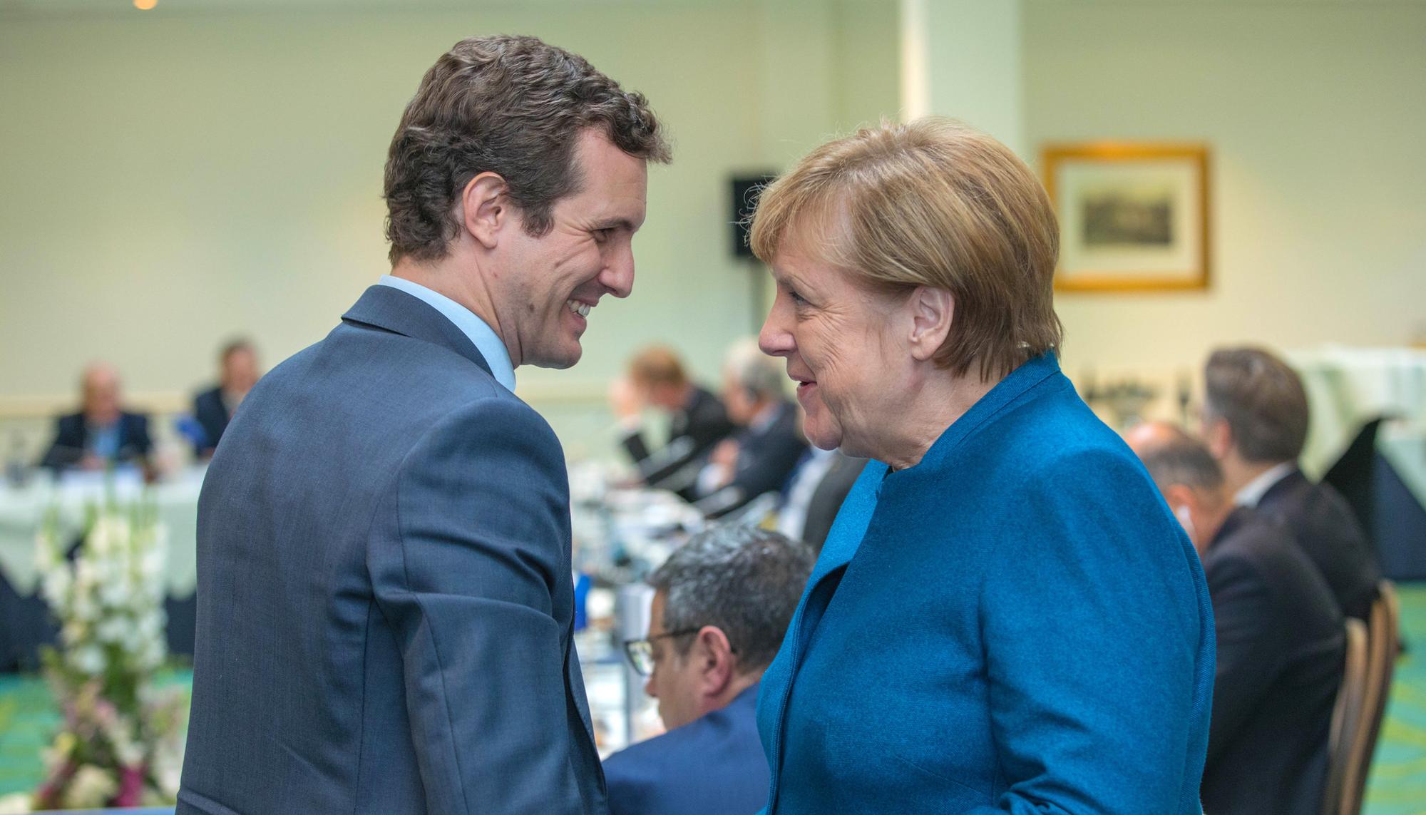 Pablo Casado y Angela Merkel